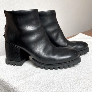 Dente Black ankle boots by Marsell . Lug sole. 3” heel. Zip back